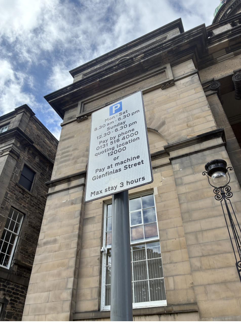 Edinburgh pay and display parking sign showing hours, phone payment number and location code, near Glenfinlas Street